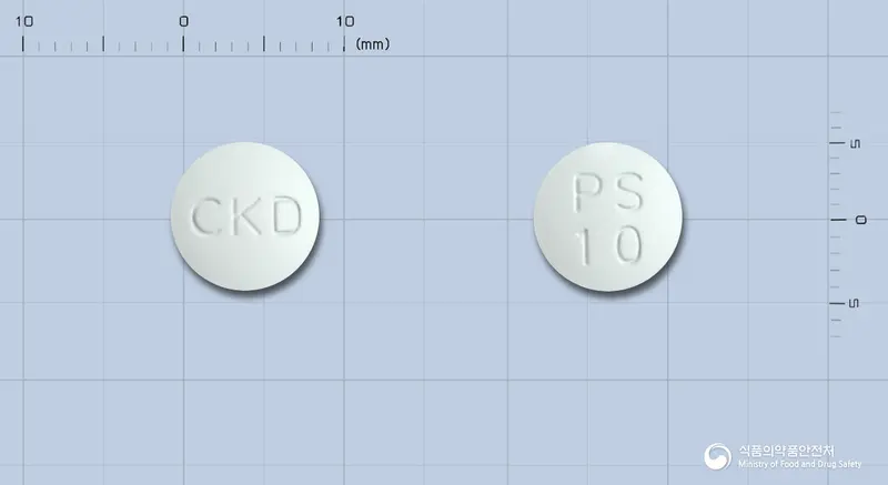 싸이렉사정10밀리그램(올란자핀)(수출용) 앞뒤 사진 (흰색 원형, 각인 CKD / PS10)