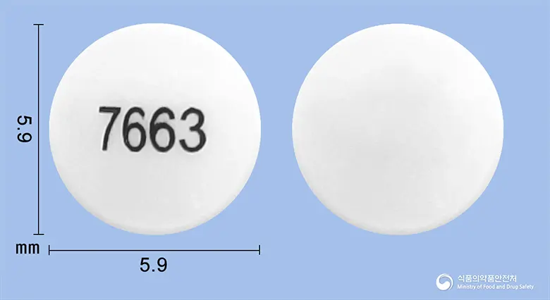 아로마신정25mg(엑스메스탄) 앞뒤 사진 (흰색 원형, 각인 7663)