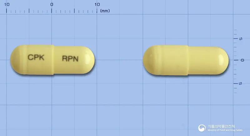 로페놀캡슐 앞뒤 사진 (노란색 캡슐, 각인 CPK RPN)