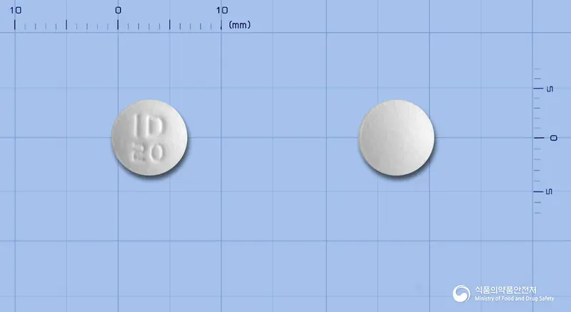 리피스톱정20밀리그램(아토르바스타틴칼슘삼수화물) 앞뒤 사진 (흰색 원형, 각인 ID20)