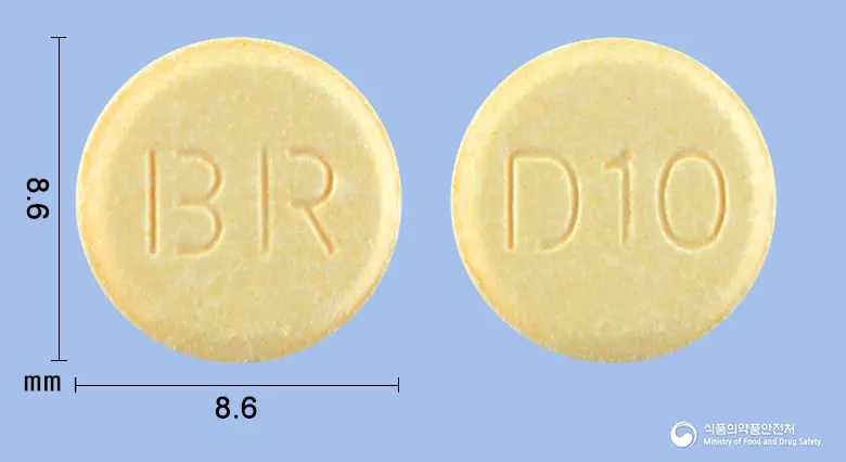 도멘탁속붕정10밀리그램(도네페질염산염수화물) 앞뒤 사진 (노란색 원형, 각인 BR / D10)