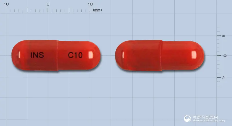 향콜에스캡슐 앞뒤 사진 (빨간색 캡슐, 각인 INS C10)