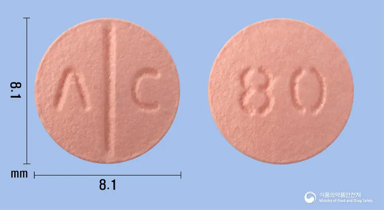 디오르반정80mg(발사르탄) 앞뒤 사진 (분홍색 원형, 각인 Λ C / 80)