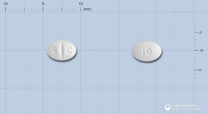 레시프람정(에스시탈로프람옥살산염) 앞뒤 사진 (흰색 타원형, 각인 S C / 10)