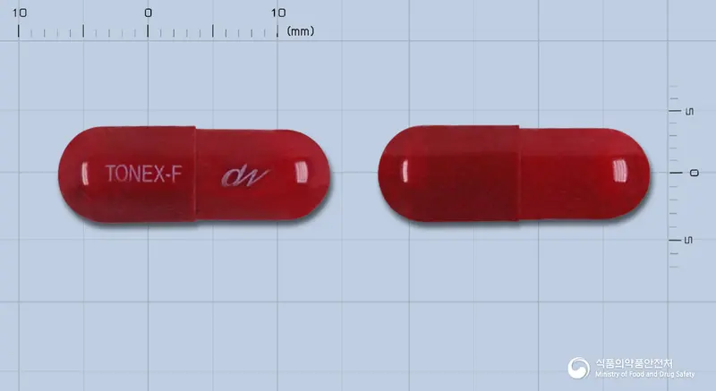 토넥스포르테캡슐 앞뒤 사진 (빨간색 캡슐, 각인 TONEX-F)