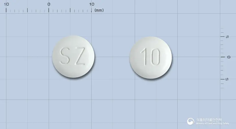 산도스올란자핀정10밀리그램 앞뒤 사진 (흰색 원형, 각인 SZ / 10)