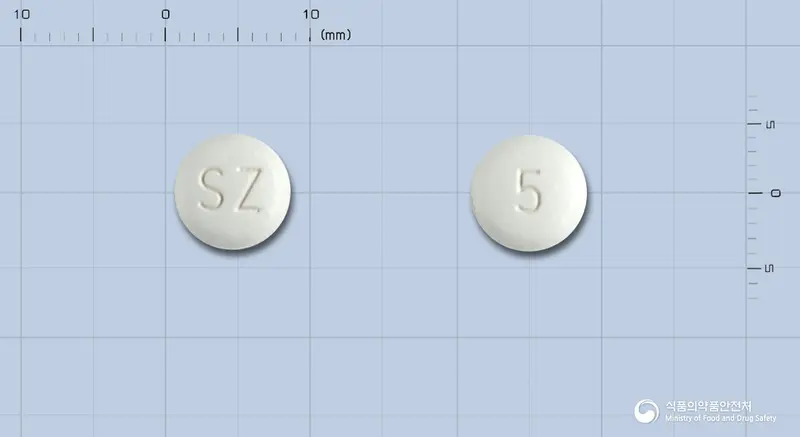 산도스올란자핀정5밀리그램 앞뒤 사진 (흰색 원형, 각인 SZ / 5)