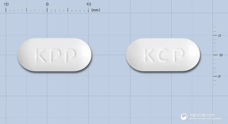 캐치콜정 앞뒤 사진 (흰색 장방형, 각인 KPP / KCP)