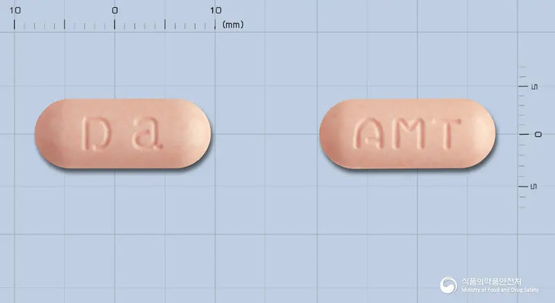 암씨롱큐정 앞뒤 사진 (분홍색 장방형, 각인 Da / AMT)