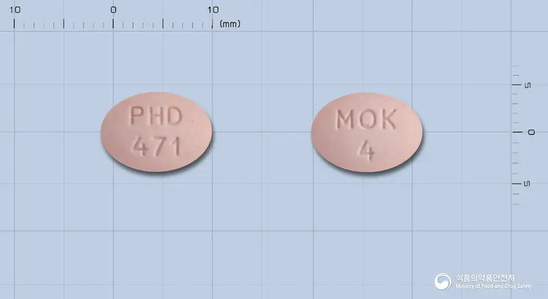 아스몬츄정4밀리그램(몬테루카스트나트륨) 앞뒤 사진 (분홍색 타원형, 각인 PHD471 / MOK 4)