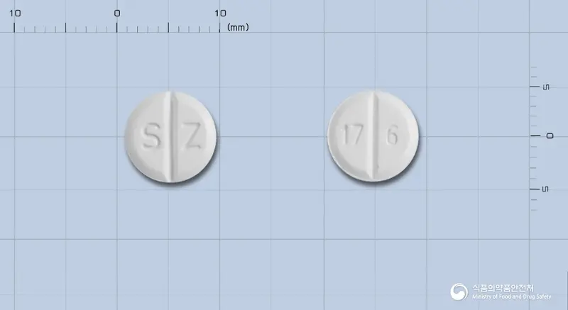 산도스프라미펙솔정1밀리그램(프라미펙솔염산염) 앞뒤 사진 (흰색 원형, 각인 S Z / 17 6)