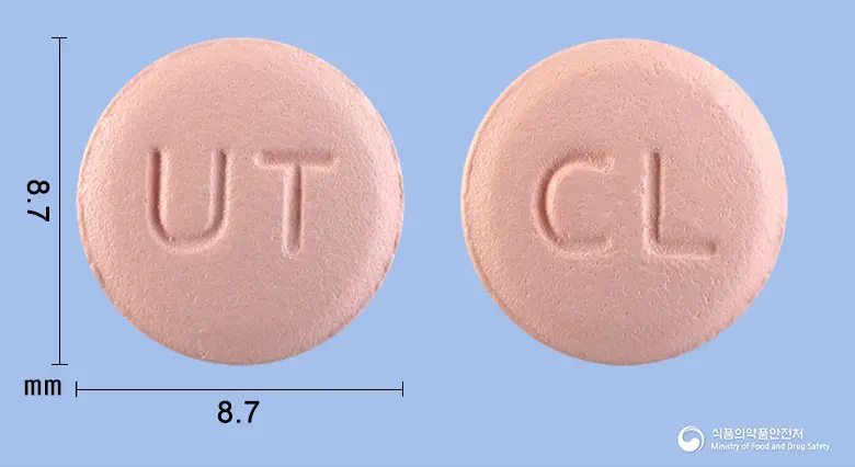 클라빅신정(클로피도그렐황산수소염) 앞뒤 사진 (분홍색 원형, 각인 UT / CL)