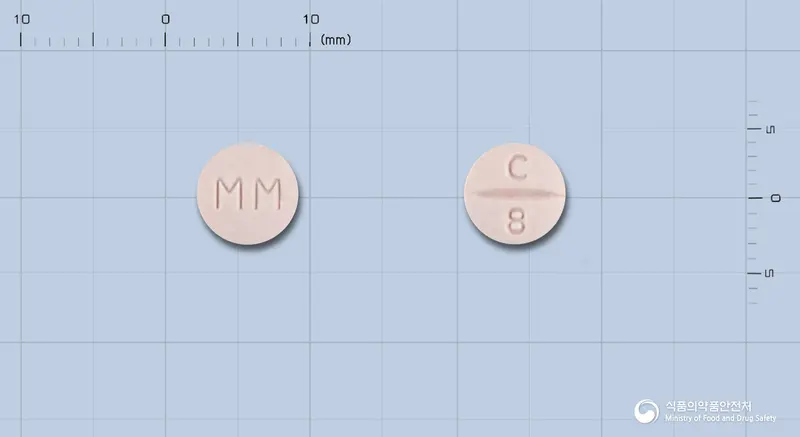 칸데산정8mg(칸데사르탄실렉세틸) 앞뒤 사진 (분홍색 원형, 각인 MM / C 8)
