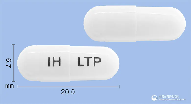 리바텍플러스캡슐 앞뒤 사진 (흰색 캡슐, 각인 IH LTP)