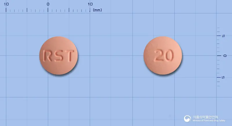 로슈타정20밀리그램(로수바스타틴칼슘) 앞뒤 사진 (분홍색 원형, 각인 RST / 20)