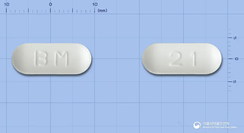 발시콜정500mg(발라시클로비르염산염) 앞뒤 사진 (흰색 장방형, 각인 BM / 21)