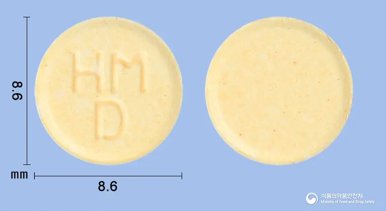 도네질오디정10밀리그램(도네페질염산염수화물) 앞뒤 사진 (노란색 원형, 각인 HMD)