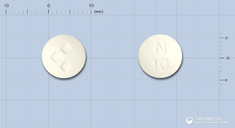 뉴로자핀정10밀리그램(올란자핀) 앞뒤 사진 (흰색 원형, 각인 N10)