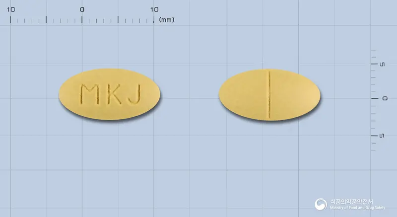 조인클정200mg(위령선,괄루근,하고초30%에탄올엑스(40:1)) 앞뒤 사진 (노란색 타원형, 각인 MKJ)