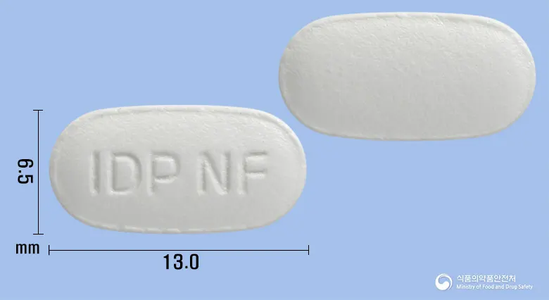 나푸롤정(나프로닐옥살산염) 앞뒤 사진 (흰색 타원형, 각인 IDP NF)