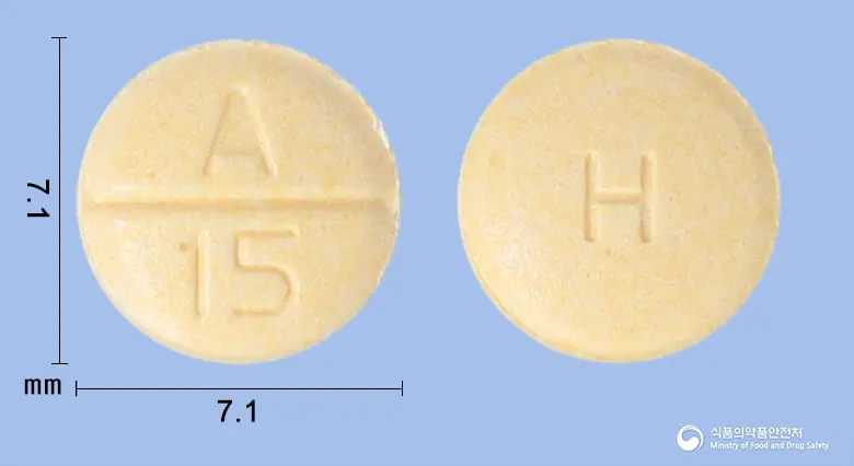 아빌라핀정15밀리그램(아리피프라졸(미분화)) 앞뒤 사진 (노란색 원형, 각인 A 15 / H)
