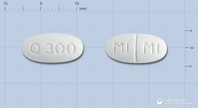 큐로켈정300밀리그램(쿠에티아핀푸마르산염) 앞뒤 사진 (흰색 타원형, 각인 Q300 / MI MI)