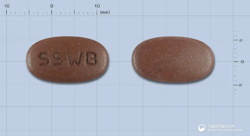 웰스비타정 앞뒤 사진 (갈색 타원형, 각인 SSWB)