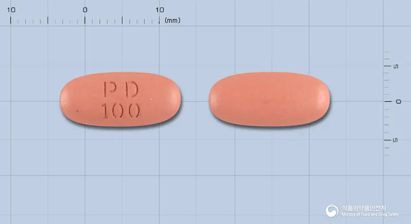 파비도엔필름코팅정 100mg/25mg/200mg 앞뒤 사진 (분홍색 타원형, 각인 PD100)