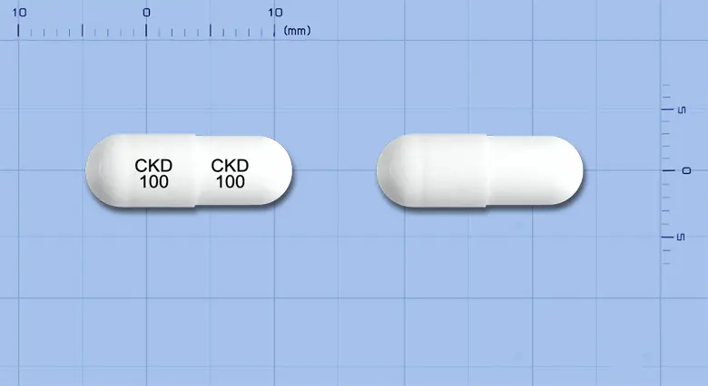 펜폴캡슐(펜토산폴리설페이트나트륨) 앞뒤 사진 (흰색 캡슐, 각인 CKD CKD100 100)