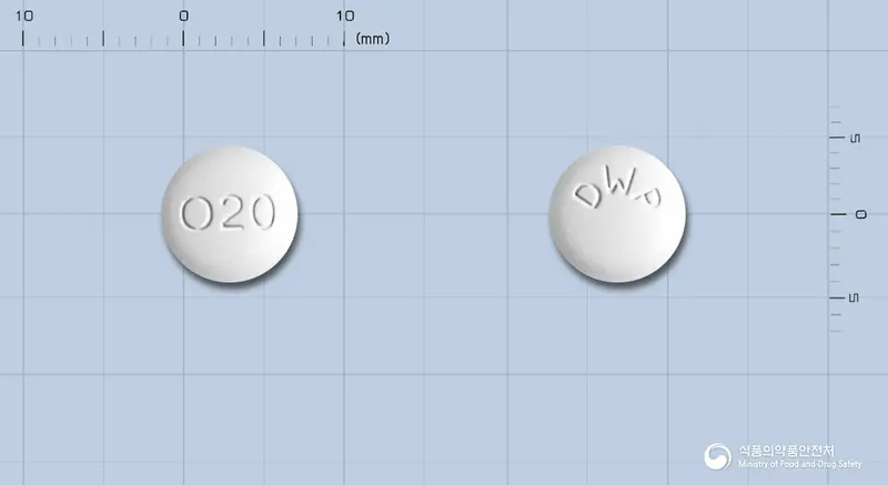 올메르탄정20밀리그램(올메사탄메독소밀) 앞뒤 사진 (흰색 원형, 각인 O20 / DWP)