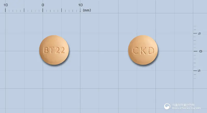 벨메텍플러스정20/12.5밀리그램 앞뒤 사진 (주황색 원형, 각인 BT22 / CKD)