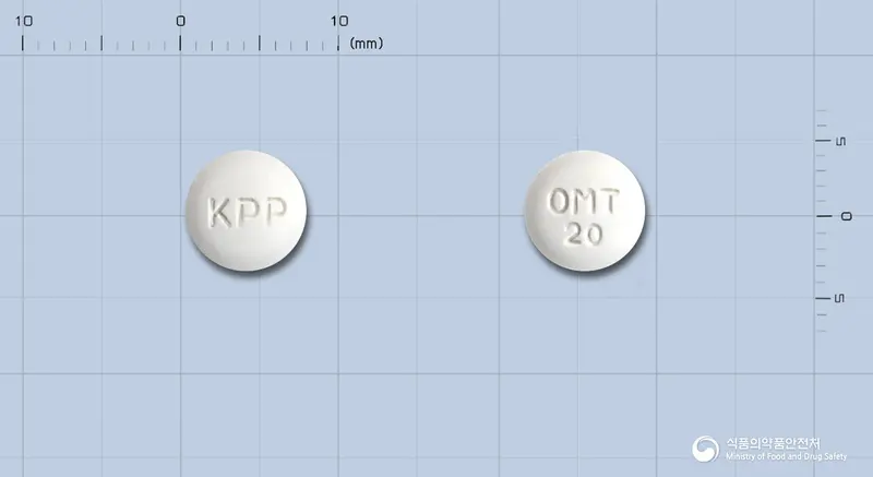 올레정20밀리그램(올메사르탄메독소밀) 앞뒤 사진 (흰색 원형, 각인 KPP / OMT20)