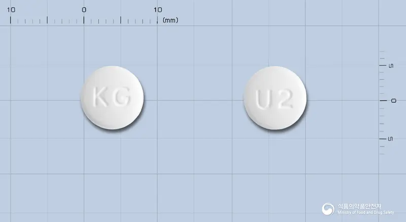 유메텍정20밀리그램(올메사탄메독소밀) 앞뒤 사진 (흰색 원형, 각인 KG / U2)