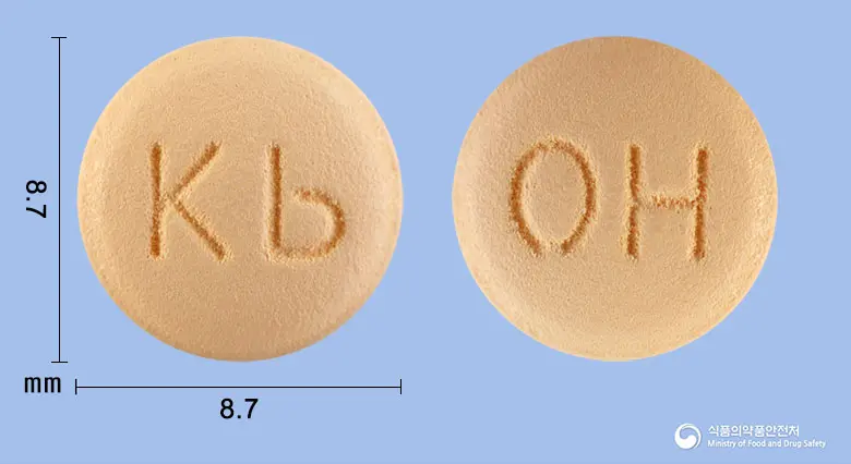 오르메탄플러스정20/12.5밀리그램 앞뒤 사진 (주황색 원형, 각인 Kb / OH)