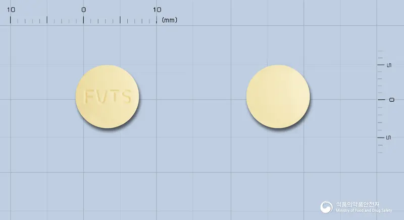 플리바스정75mg(나프토피딜) 앞뒤 사진 (노란색 원형, 각인 FVTS)