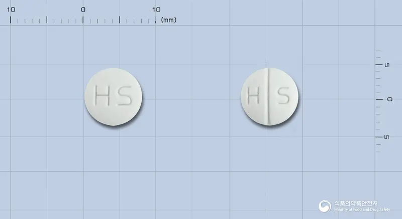 휴온스요오드화칼륨정 앞뒤 사진 (흰색 원형, 각인 HS / H S)