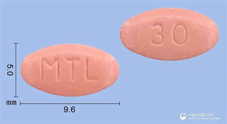 모티리톤정 앞뒤 사진 (분홍색 타원형, 각인 MTL / 30)