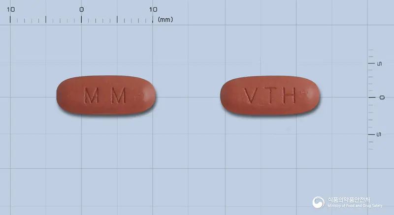 발사닌플러스정160/12.5밀리그램 앞뒤 사진 (빨간색 타원형, 각인 MM / VTH)