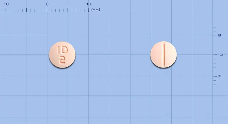 피타큐정2밀리그램(피타바스타틴칼슘) 앞뒤 사진 (분홍색 원형, 각인 ID2)