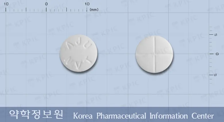 네비칸정(네비보롤염산염) 앞뒤 사진 (흰색 원형, 각인 ΛJUNVT)