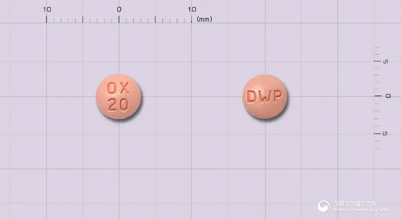 프로콘틴서방정20mg(옥시코돈염산염) 앞뒤 사진 (분홍색 원형, 각인 OX20 / DWP)
