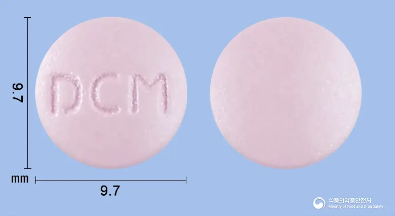 멜아웃정 앞뒤 사진 (분홍색 원형, 각인 DCM)