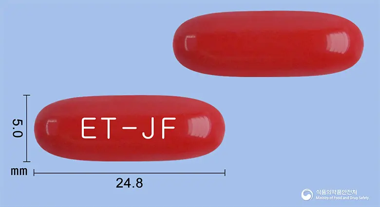 메가콘사민-에프연질캡슐 앞뒤 사진 (빨간색 캡슐, 각인 ET-JF)