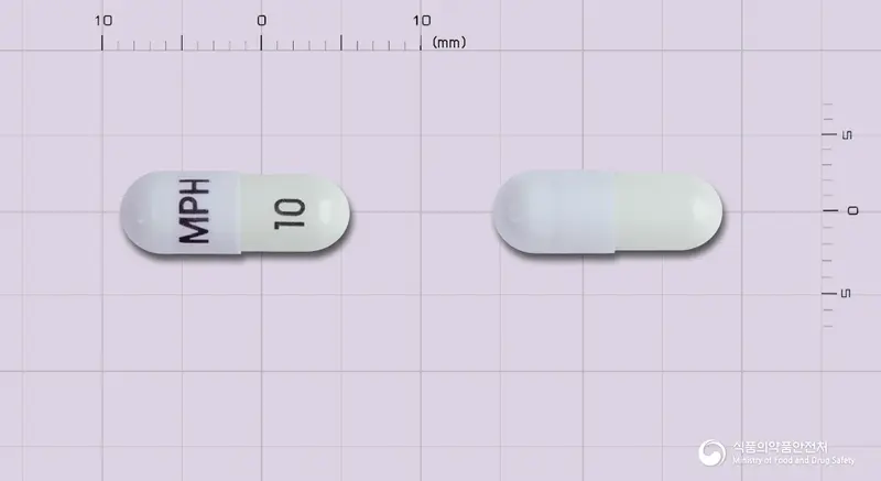 메디키넷리타드캡슐10mg(메틸페니데이트염산염) 앞뒤 사진 (보라색 캡슐, 각인 MPH 10)