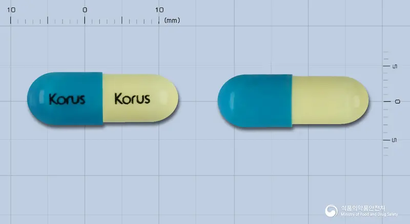 세파신캡슐(세팔렉신수화물)(수출명:Medicephal cap.) 앞뒤 사진 (파란색 캡슐, 각인 Korus Korus)