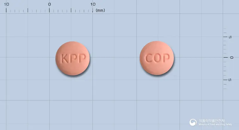 플빅스정(클로피도그렐황산염) 앞뒤 사진 (분홍색 원형, 각인 KPP / COP)