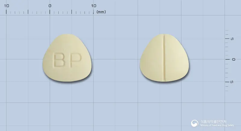 보라린큐정 앞뒤 사진 (노란색 삼각형, 각인 BP)