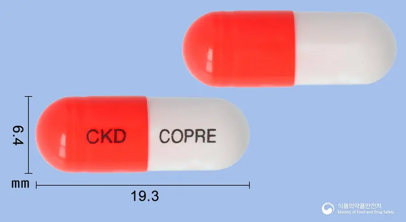 코프리그렐캡슐 앞뒤 사진 (주황색 캡슐, 각인 CKD COPRE)