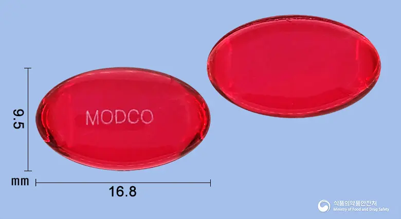 모드코에스연질캡슐 앞뒤 사진 (빨간색·투명 캡슐, 각인 MODCO)