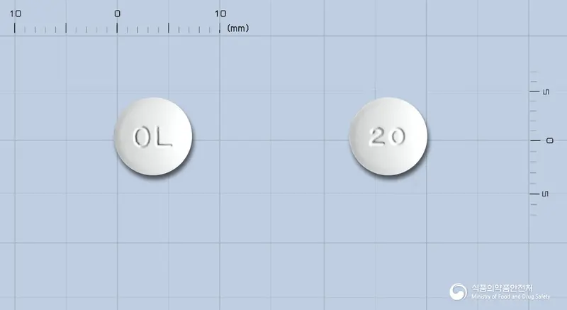 올사르탄정20밀리그램(올메사르탄메독소밀) 앞뒤 사진 (흰색 원형, 각인 OL / 20)